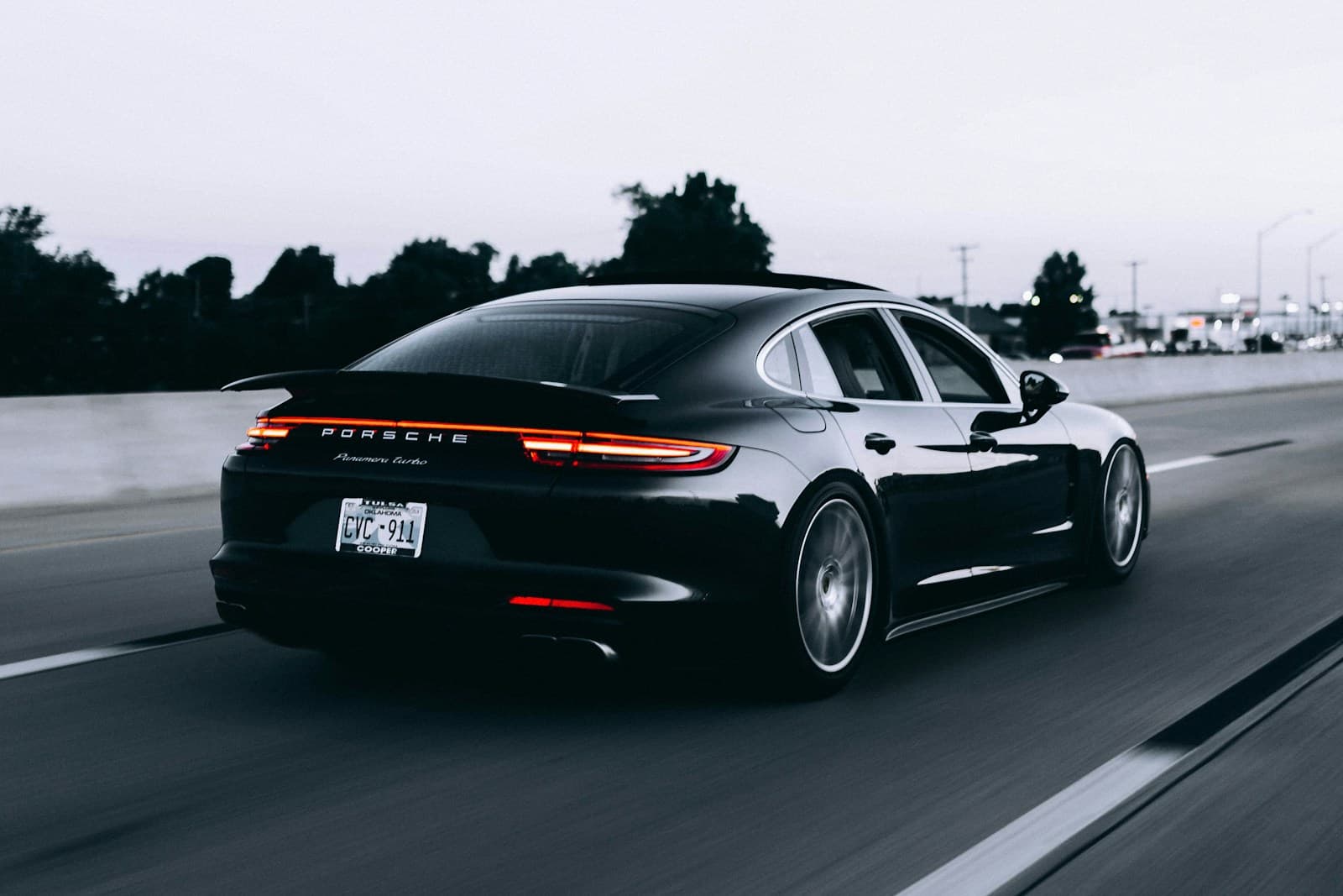 Porsche parked on an open road